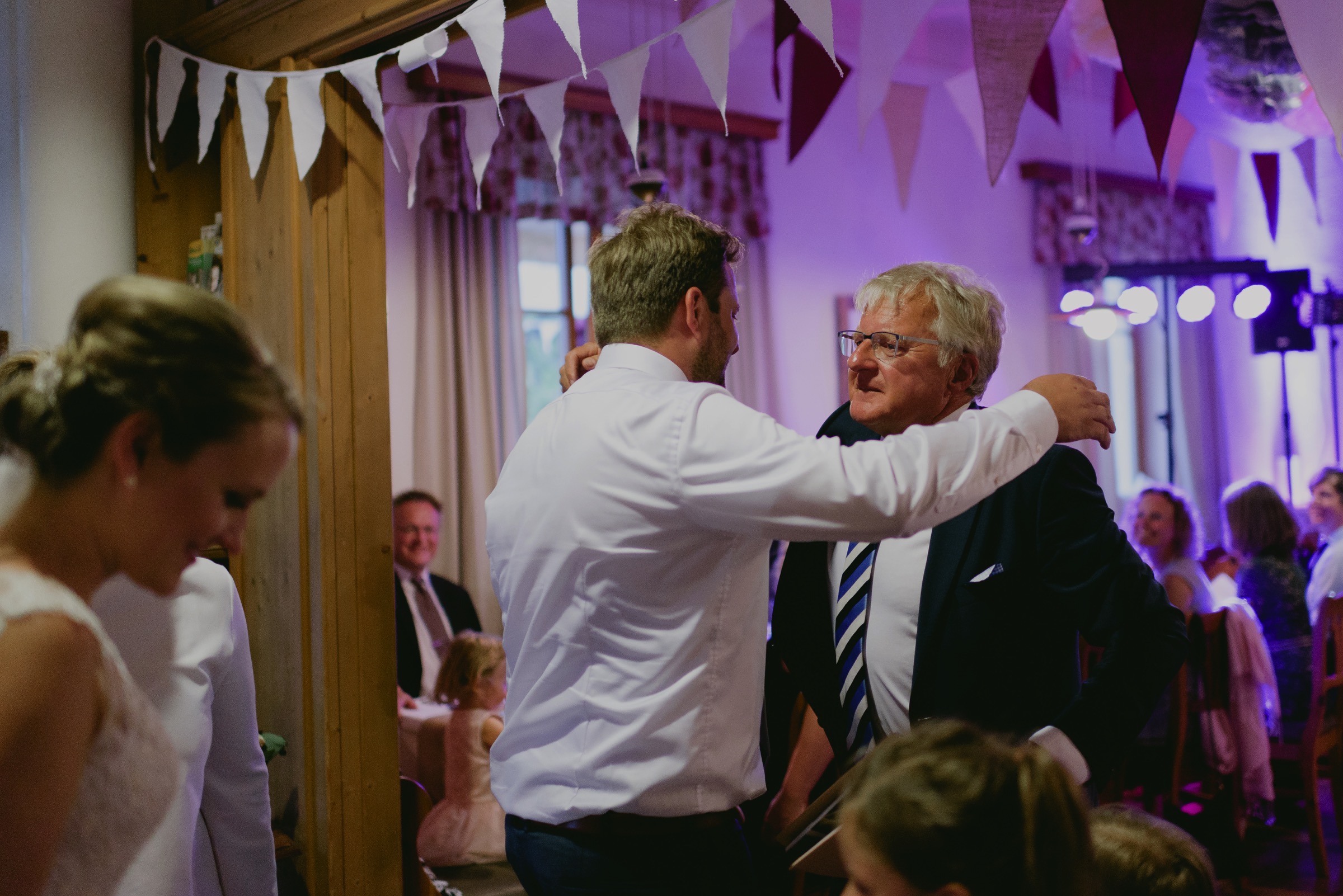 father and son moment at the wedding in austria